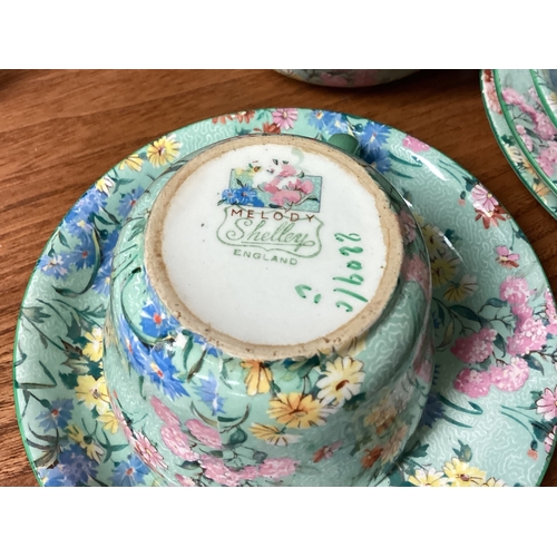 16 - A decorative Shelley part tea service. Est. £20 - £30.