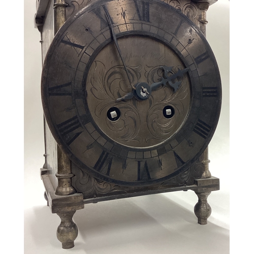 169 - A brass mounted lantern clock. By Mappin & Webb. Est. £80 - £120.