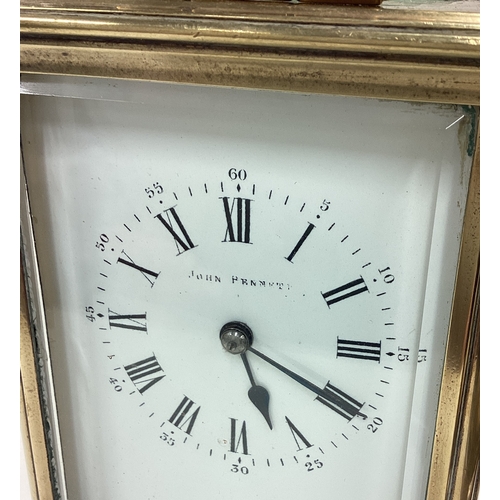 170 - A large brass carriage clock with white enamelled dial. Est. £50 - £80.