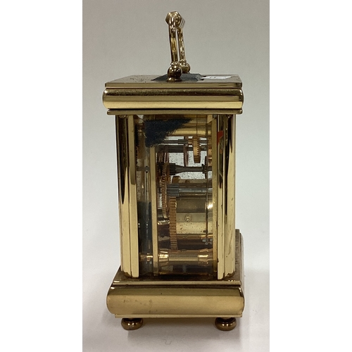 175 - A good brass miniature carriage clock. Est. £30 - £50.