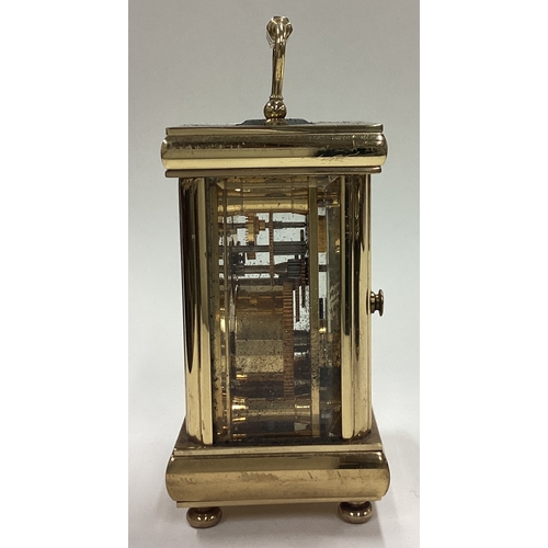 175 - A good brass miniature carriage clock. Est. £30 - £50.