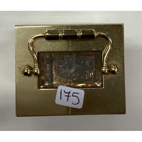 175 - A good brass miniature carriage clock. Est. £30 - £50.