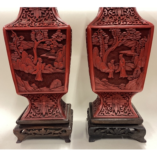 189 - A pair of good Chinese lacquer vases of shaped form. Est. £20 - £30.