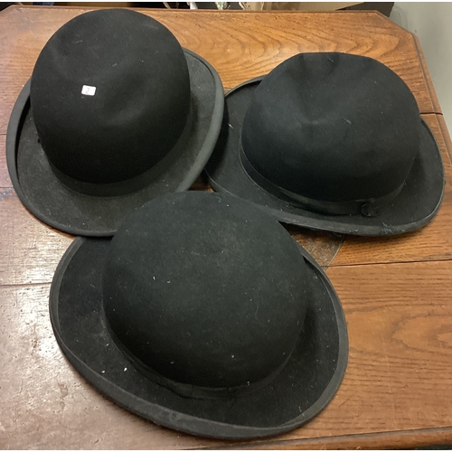 2 - A collection of top hats. Est. £20 - £30.