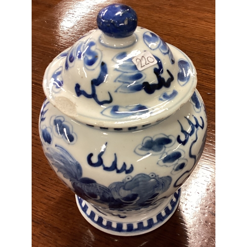 220 - A good Chinese blue and white vase and cover of circular form. Signed to base. Est. £80 - £120.