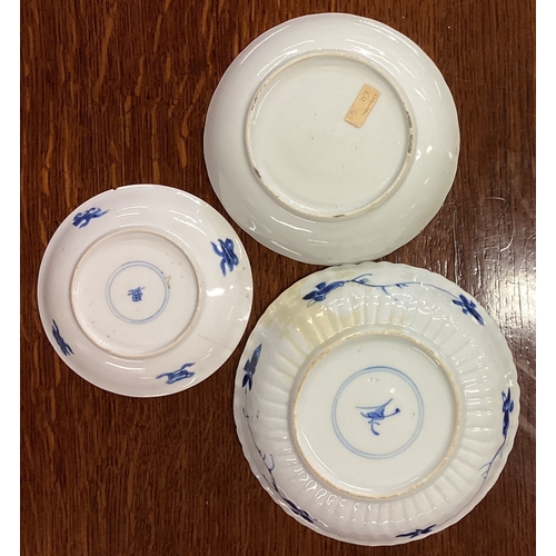 221 - A group of three Chinese tea bowls with figural decoration. Est. £20 - £30.