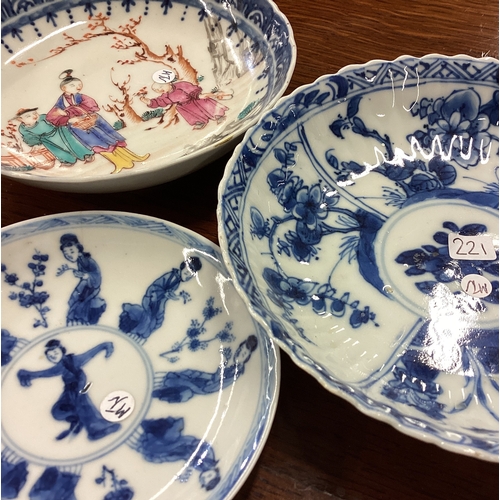 221 - A group of three Chinese tea bowls with figural decoration. Est. £20 - £30.