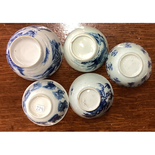 229 - A group of five Nanking blue and white dishes. Est. £30 - £50.