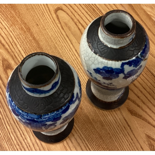 233 - A pair of Chinese crackleware vases. Est. £20 - £30.