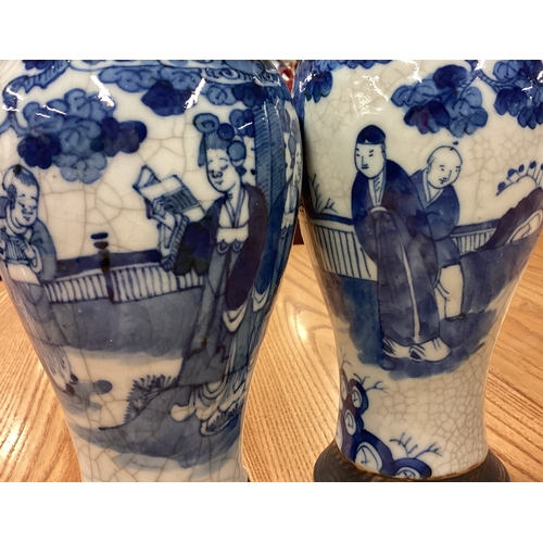 233 - A pair of Chinese crackleware vases. Est. £20 - £30.