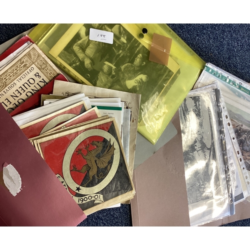 234 - A wallet containing film stills together with Military ephemera and Royalty souvenirs. Est. £20 - £3... 