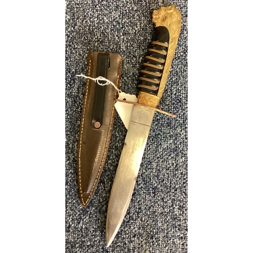 245 - An Italian Army Officer's dagger in scabbard. Est. £20 - £30.