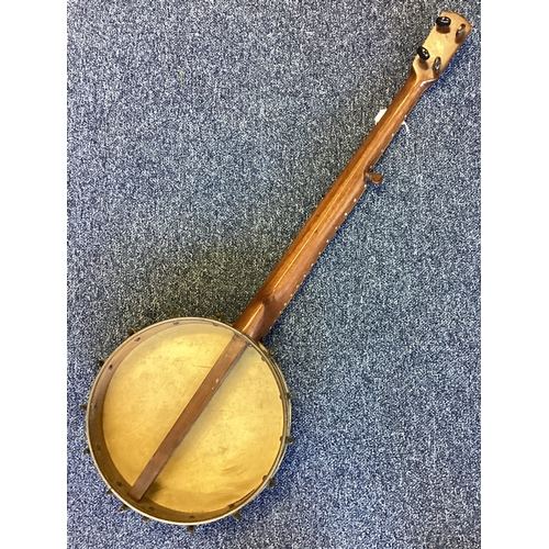 287 - A five-string banjo. Est. £20 - £30.