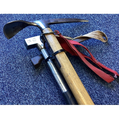 304 - Two climbing axes together with an ice pick. Est. £20 - £30.