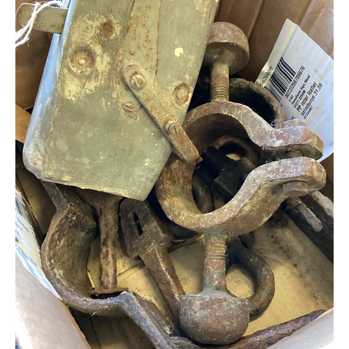 305 - A box containing a complete set of iron work for a cannon. Est. £20 - £30.