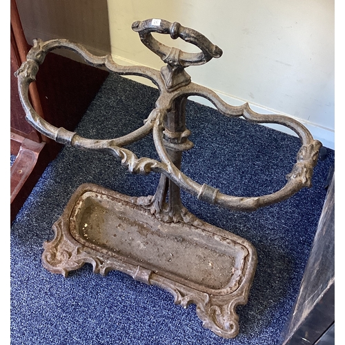 309 - A large cast iron stick stand. Est. £20 - £30.