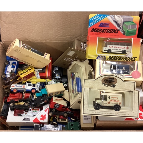 37 - A box containing toy cars etc. Est. £20 - £30.