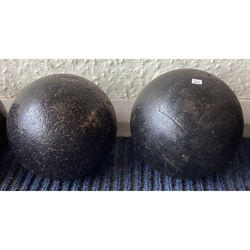 383 - Two old cannon balls. Est. £20 - £30.