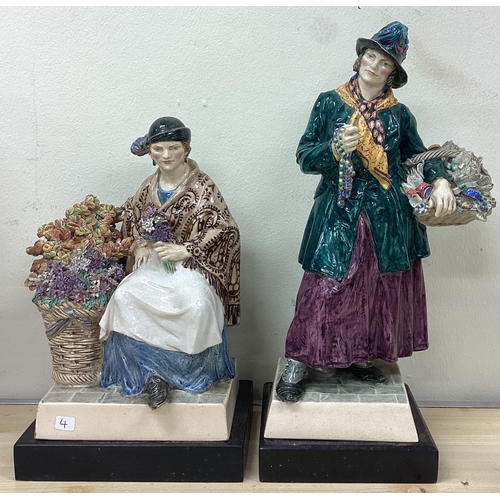 4 - Two decorative figures. Est. £20 - £30.