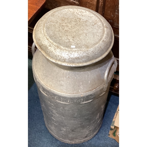 44 - An old aluminium milk churn. Est. £40 - £60.