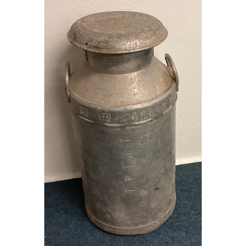 44 - An old aluminium milk churn. Est. £40 - £60.