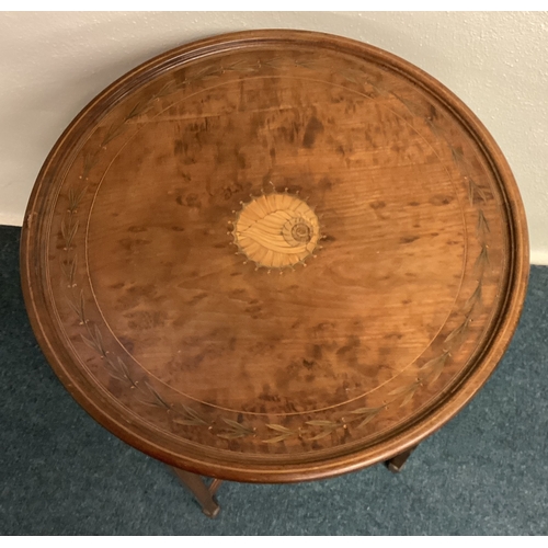 453 - A Victorian inlaid occasional table. Est. £50 - £80.