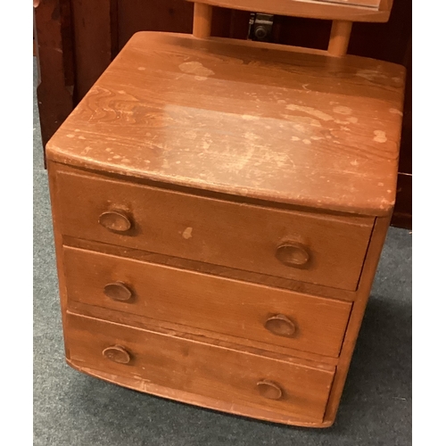 487 - ERCOL: A good dressing mirror. Est. £100 - £150.