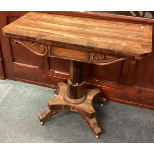 490 - A rosewood hinged top table. Est. £30 - £50.