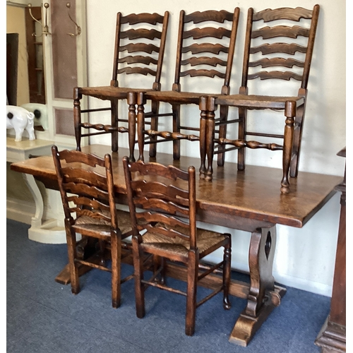 522 - An oak plank top table together with six chairs. Est. £50 - £80.