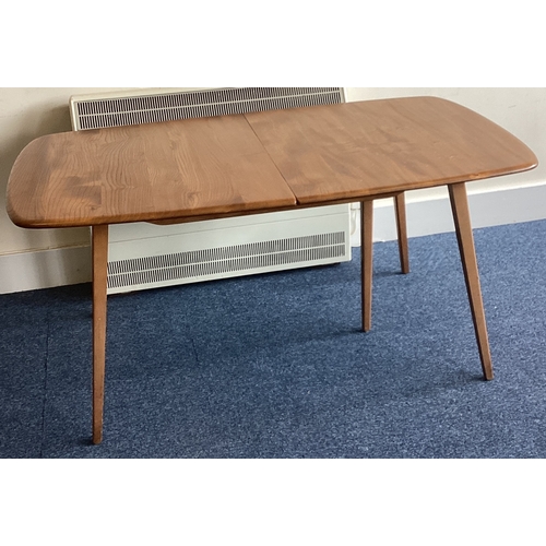 525 - ERCOL: A drawer leaf table on four spreading supports. Est. £50 - £80.