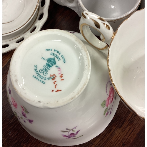 73 - A Staffordshire part tea service etc. Est. £20 - £30.