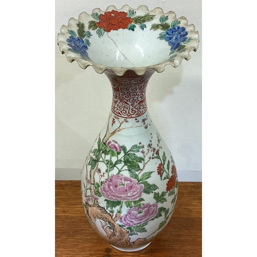 195 - A large Chinese floral baluster shaped vase with shaped rim. Est. £30 - £50.