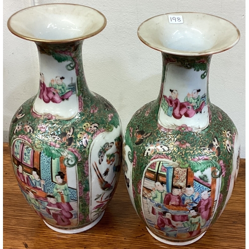 198 - A pair of Canton vases with figural decoration. Est. £40 - £60.