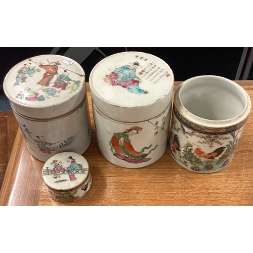 202 - A group of cylindrical Chinese pots and covers. Est. £20 - £30.