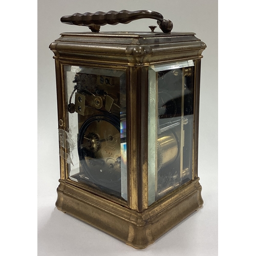 176 - A good French striking carriage clock with white enamelled dial. Est. £150 - £200.