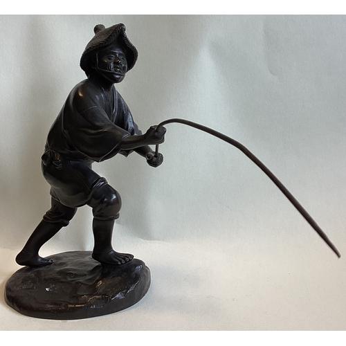 213 - A good Chinese bronze of a gent fishing. Seal mark to base. Est. £200 - £300.