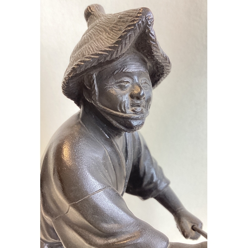 213 - A good Chinese bronze of a gent fishing. Seal mark to base. Est. £200 - £300.