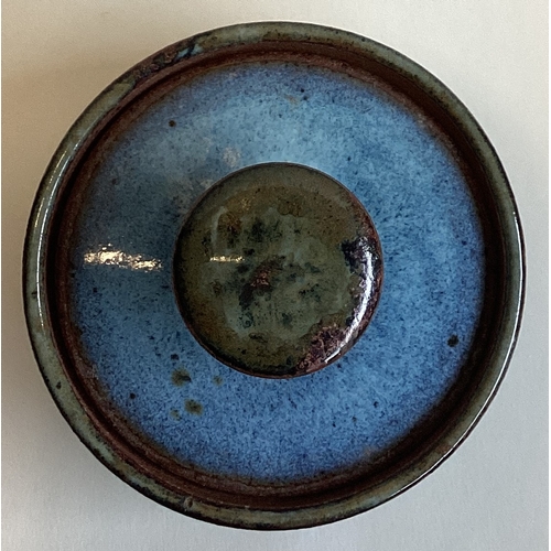 579 - SARAH JANE LANDER (British): A small blue glazed lidded stoneware pot with blue glazed interior. Imp... 