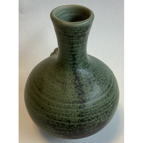 581 - A small celadon stoneware bud vase with tree frog to side. Approx. 13 cms high. Marked 'H' to base. ... 