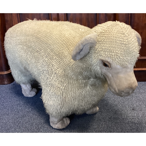 9A - A large woolly sheep footstool nicknamed 'Nigel'. Approx. 55 cms high. Est. £20 - £30.