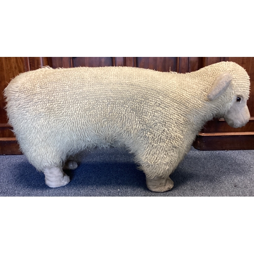 9A - A large woolly sheep footstool nicknamed 'Nigel'. Approx. 55 cms high. Est. £20 - £30.