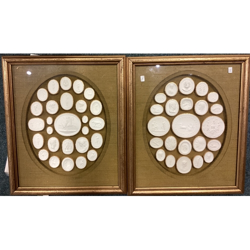 552 - A pair of framed plaster ingots. Est. £30 - £50.