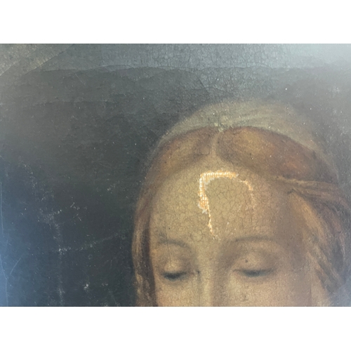 115 - AFTER RAPHAEL: A gilt framed oil on canvas depicting the face and torso of the Madonna of the Goldfi... 