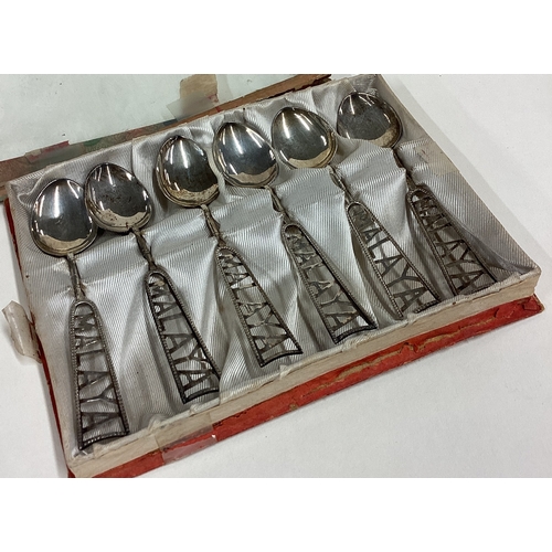 112 - A cased set of six Chinese silver 'Malaya' spoons. Approx. 58 grams. Est. £50 - £80.