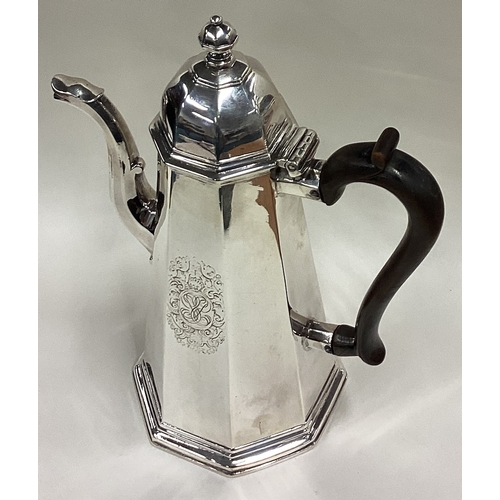 115 - An octagonal George I silver coffee pot. London 1715. By Richard Green. Approx. 770 grams. Est. £350... 