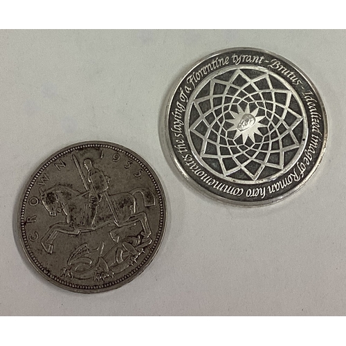 128 - A heavy 1935 silver Crown coin together with a silver medallion. Approx. 57 grams. Est. £30 - £40.