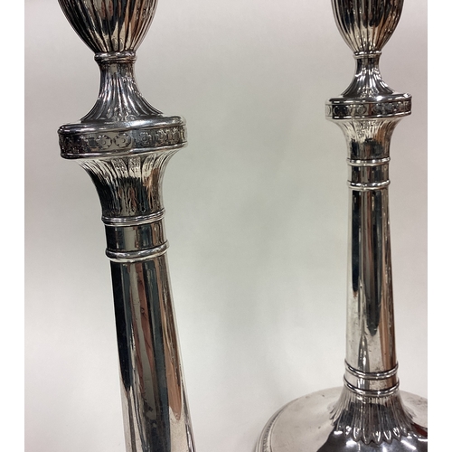 129 - A fine pair of 18th Century George III silver candlesticks. Sheffield 1782. By John Parsons & Co. Ap... 