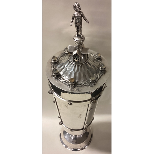 134 - OMAR RAMSDEN: A large silver lidded trophy cup. Lid signed 'Omar Ramsden Me Fecit'. Approx. 42cm hig... 