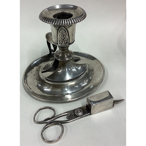 149 - An 18th Century silver candle snuffer on stand. Approx. 281 grams. Est. £250 - £300.