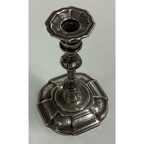 162 - A Victorian cast silver taper stick. London 1849. Approx. 116 grams. Est. £150 - £200.